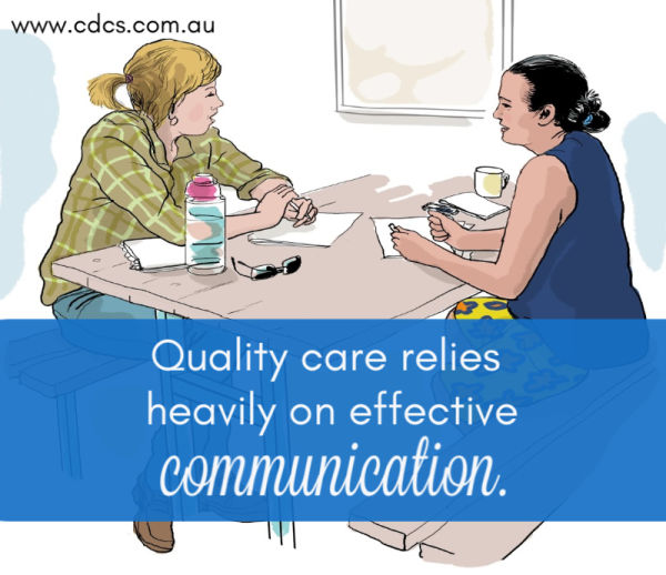 Coworkers sitting at a table with papers, talking to each other. A caption reads: Quality care relies heavily on effective communication.