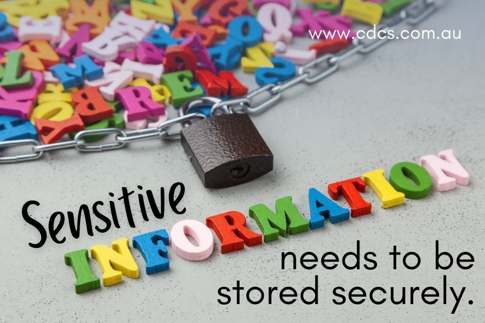 Colourful letters scattered on a grey benchtop, surrounded by a lock and chain. The word Information is spelled out in colourful letters and separated from the other letters. Text reads: Sensitive information needs to be stored securely.