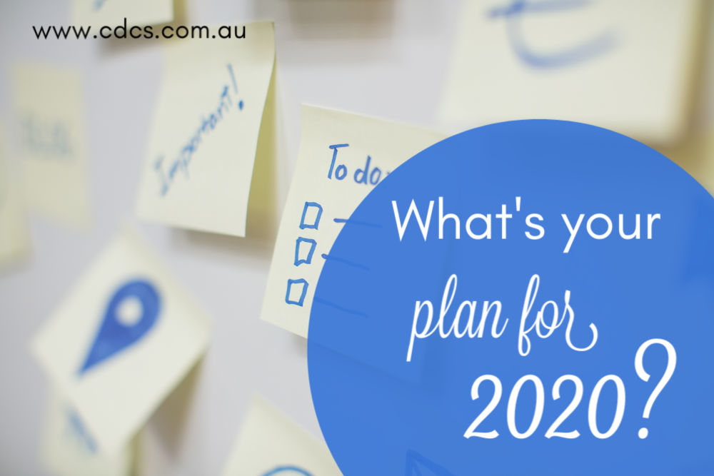 What are your 2020 plans? White sticky notes with blue writing.