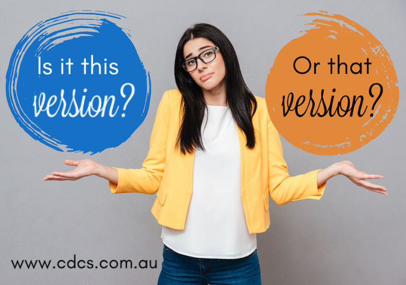 Confused young woman dressed in yellow jacket over grey background. Text says "This version or that version?"
